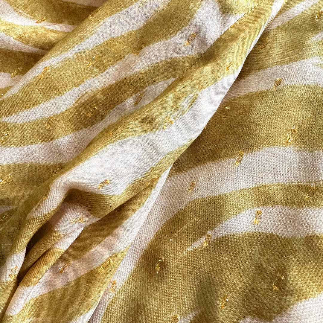 Fabric with gold fleck detail on Wanderland Kaftan